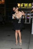 Bai Ling legs and cleavage in short dress