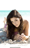 Ashley Greene naked body painted on a beach