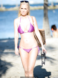 Blonde Ana Braga sunabthing topless at Miami Beach - April 07, 2014