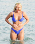 Amber Turner in blue bikini in a water