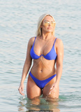 Amber Turner in blue bikini in a water