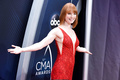 Redhead Alicia Witt sexy in red dress