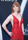 Redhead Alicia Witt sexy in red dress