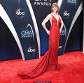 Redhead Alicia Witt sexy in red dress