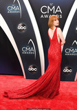 Redhead Alicia Witt sexy in red dress