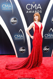 Redhead Alicia Witt sexy in red dress