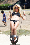 Alicia Douvall  in a black bikini at Santa Monica Beach, July 25, 2010