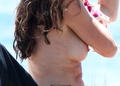 Alba Parietti topless on a beach in Ibiza paparazzi photos - June 2014