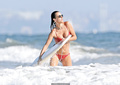 Alessandra Ambrosio in red bikini on a beach in Malibu - August 31, 2019