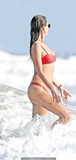 Alessandra Ambrosio in red bikini on a beach in Malibu - August 31, 2019