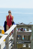 Alexandra Daddario cleavage in red swimsuit