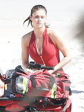 Alexandra Daddario cleavage in red swimsuit