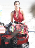 Alexandra Daddario cleavage in red swimsuit