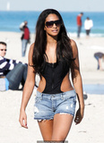 Alesha Dixon in black swimsuit and tiny shorts
