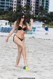 Claudia Romani sexy in black bikini on the beach in Miami - November 20, 2019