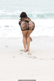 Claudia Romani sexy in black bikini on the beach in Miami - November 20, 2019