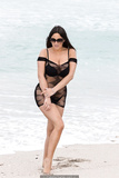 Claudia Romani sexy in black bikini on the beach in Miami - November 20, 2019