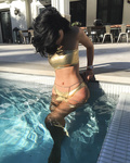 Kylie Jenner in a Bikini (3 Photos)