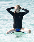 Cara Delevingne in a Bikini (17 Photos)