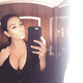 Kim Kardashian Cleavage (2 New Photos)