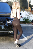 Khloe Kardashian Braless (9 Photos)