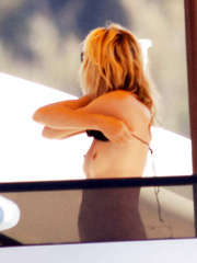 Heidi Klum topless on a yacht (08/2008)