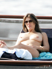 Elizabeth Hurley - sunbath in Capri, Italy (7/2005)
