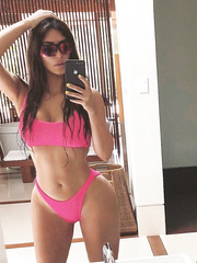 Kim Kardashian big boobs and bikini pics