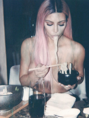 Kim Kardashian showing off big nude boobs