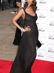 Iman braless in see through dress at red carpet