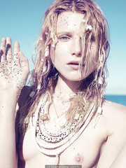 Dree Hemingway see through and topless on a beach
