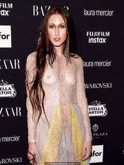 Anna Cleveland braless in see through dress at Harper’s Bazaar Icons party at