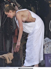 Amber Heard has a tit slip while cleaning out her garage - Juny 30, 2018