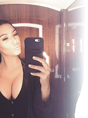 Kim Kardashian Cleavage (2 New Photos)