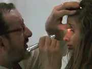 Explicit medical examination scene