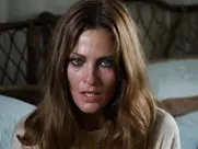 Olga Karlatos as Mrs. Menard in Zombie (1979)