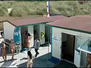 Nudist beach scene from Maschi contro femmine (2010)