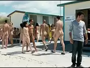 Nudist beach scene from Maschi contro femmine (2010)