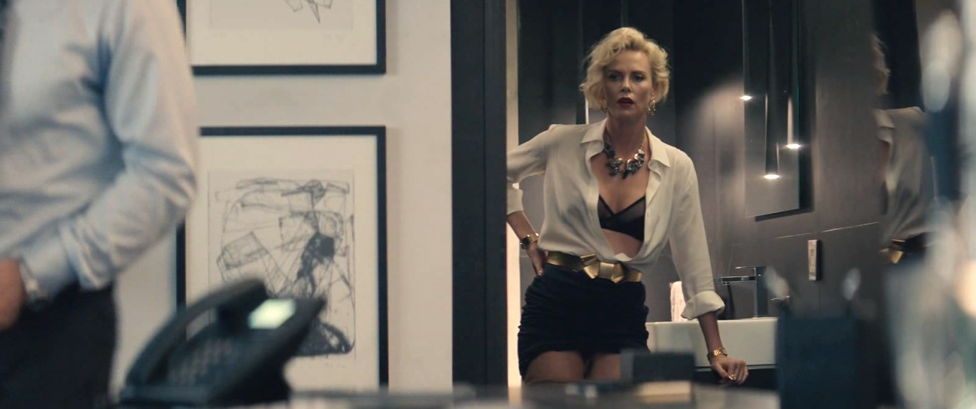 Charlize Theron (42 years) in sexy scenes from Gringo (2018). 